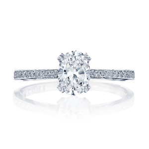 2679OV7X5W white gold oval solitaire, top view showing diamond set prongs and channel pave shoulders