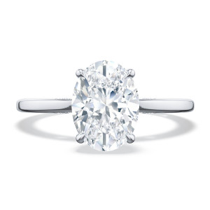 2682ov Platinum top view of oval cut solitaire on a plain polished platinum band