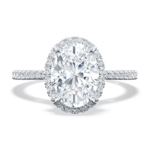 268415ov Platinum engagement ring, top view of the oval center inside a close diamond halo