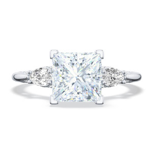 2685pr Platinum engagement ring, top view of the princess cut center between two pear shape side stones