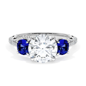 40727RD8BS Platinum top view, round brilliant center flanked by round blue sapphires on a pave band