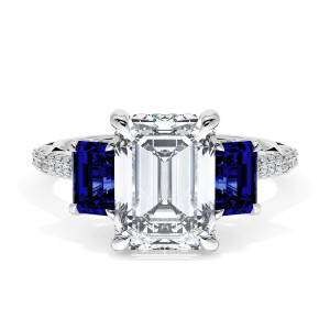 40827EC95X7BS Platinum top view, emerald cut center stone flanked by two emerald cut blue sapphires on a pave platinum band