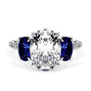 40827OV11X8BS Platinum top view, oval center stone flanked by oval blue sapphires on pave white metal band