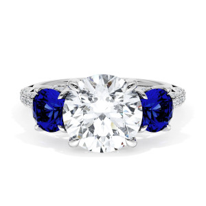 40827RD9BS Platinum top view, round brilliant center between two oval blue sapphires on a pave band