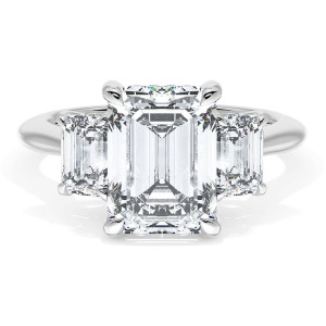 41127EC95X7W top view, emerald cut center with two smaller emerald cut side stones on a polished band