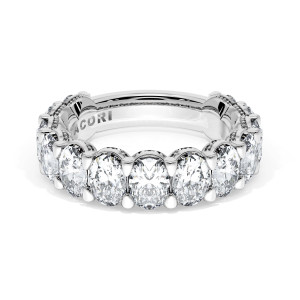 4186534 Platinum wedding band angled top view showing oval diamonds in claw prongs on white metal