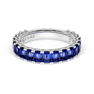 41965BS34 Platinum wedding band, angled top view showing emerald cut blue sapphires and inner engraving