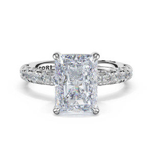 46825RAD95X7 Platinum ring, top view of the elongated radiant cut center stone and pave set band
