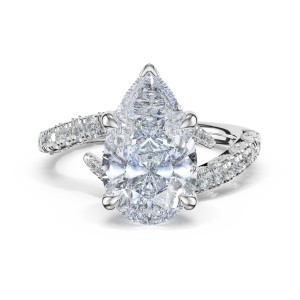 473PS Platinum ring, top view of the pear shaped center stone and curved pave set bypass shank