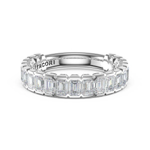 4766534 Platinum wedding band, angled top view showing the emerald cut diamond row and TACORI engraving