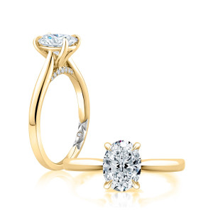 A.JAFFE MECOV2543/183B 14 Karat engagement ring, yellow gold oval solitaire engagement ring standing profile view beside a top view of the setting