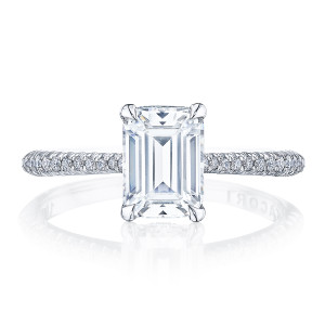 HT2581EC75x55W top view: emerald cut center with hidden collar on a slim pave diamond band