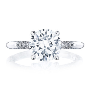 HT2582RD8W white gold ring top view, round brilliant center stone on a band with spaced pave leaf clusters