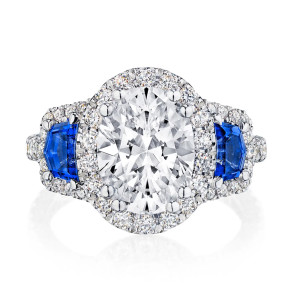 Tacori Petite Crescent platinum three-stone engagement ring with oval center and blue sapphire side stones