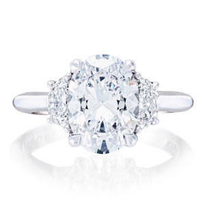 HT2690OV Platinum ring, top view of oval cut center flanked by half moon diamond side stones