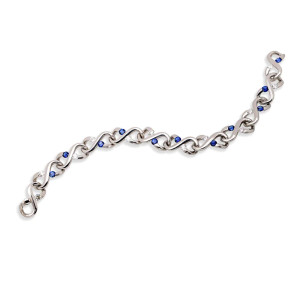Kretchmer 18 Karat Small Diamond & Sapphire Infinity Tension Set Bracelet
