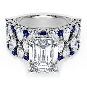 21EC11X8BS112W top view, emerald cut center on a wide band of marquise diamonds with round blue sapphire accents