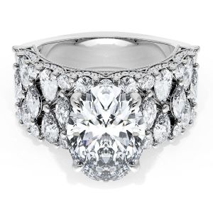 21OV125X912W top view, large oval center stone on a wide white gold band with marquise and round accents