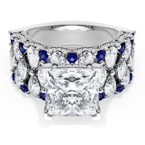 21PR9BS112W top view, princess cut center stone on a wide white gold band of marquise and round diamonds with blue sapphire accents