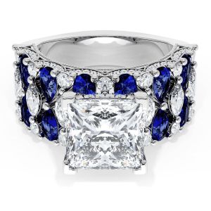 21PR9BS212W top view, princess cut center on a wide white gold band with blue sapphires and white diamonds