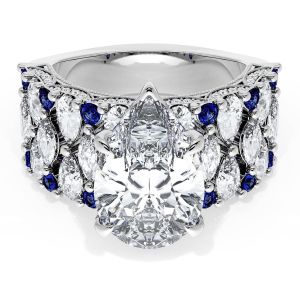 21PS14X9BS112W top view, pear cut center on wide white metal band of marquise and pear diamonds with blue sapphire accents