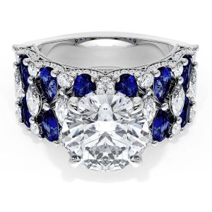 21RD10BS212W top view, round brilliant center stone on a wide white metal band of blue sapphires and diamonds