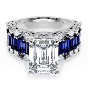 23EC11X8BS212 Platinum ring, top view of emerald cut center with a band row of emerald cut blue sapphires
