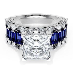 23PR9BS212W top view, princess cut center stone over a white gold band with step cut blue sapphires framed by round diamonds