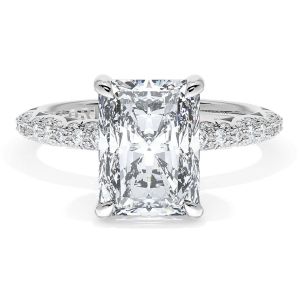 40224RAD95X7W white gold ring top view, radiant cut center stone on a slim three row micro pave diamond band