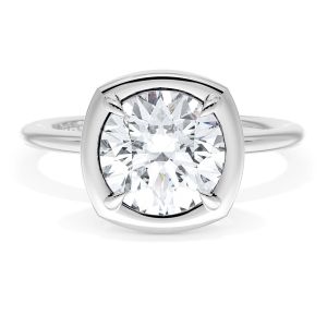 40417CURD8 Platinum top view, round brilliant center inside a cushion shaped white metal frame on a plain band