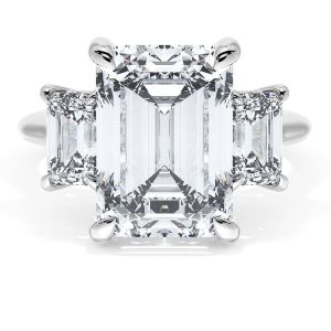 41227EC12X85W white gold ring top view, emerald cut center stone flanked by two smaller step cut diamonds
