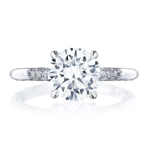 HT2582RD8W white gold ring top view, round brilliant center stone on a band with spaced pave leaf clusters