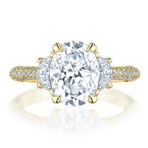 HT2689OV10x75Y top view, oval center stone flanked by half moon diamonds on a yellow gold pave band