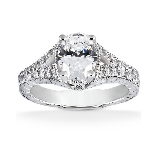 Taryn Collection ENR6789 platinum diamond engagement ring, front view of an oval center above split shoulders of graduated pave stones with milgrain edges