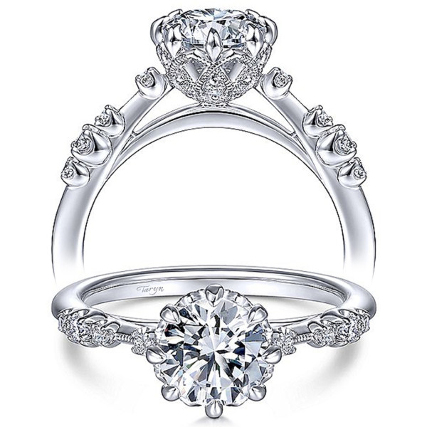 Taryn TE15194R4W44JJ 14 karat white gold engagement ring, front and profile views of a round center in an openwork milgrain basket above evenly spaced shoulder accents