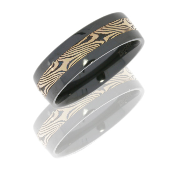 Lashbrook Z7F13/M14KRSH zirconium wedding band, angled view of a polished face with an offset mokume inlay stripe in gold and dark swirls