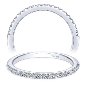 Taryn TW5828W44JJ 14 karat white gold wedding band, front view of very fine shared prong stones spanning a notably slender polished rail