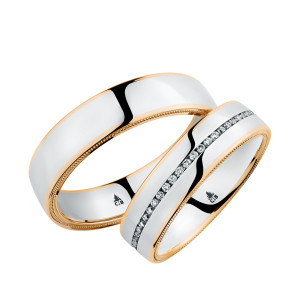 Christian Bauer 247001 two-tone 18 karat gold diamond wedding band, angled view of a flat polished white face with a channel of tiny stones between rose milgrain edges, shown with its matching ring