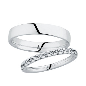 Christian Bauer 247062 platinum diamond wedding band, angled view of a polished rounded profile with a half row of small round stones in scalloped shared prongs, shown with its matching ring