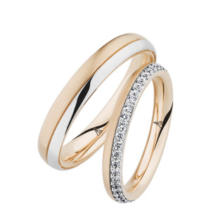 Christian Bauer 247087 two-tone platinum and 18 karat gold diamond wedding band, angled view of a polished rose rounded profile with a white pave rail of small stones set along one edge, shown with its matching ring