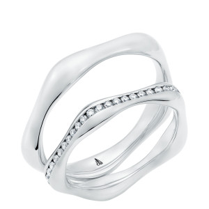 Christian Bauer 247145 platinum diamond wedding band, angled view of a polished sculpted profile with a wavy outline and a channel of small stones following the wave, shown with its matching ring