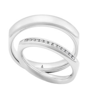 Christian Bauer 247146 18 karat white gold diamond wedding band, angled view of a polished softly squared outline with a straight channel of small stones across the front, shown with its matching ring