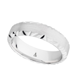 Christian Bauer 274523 platinum wedding band, angled view of a brushed dome edged by irregular chisel cut polished facets along both sides