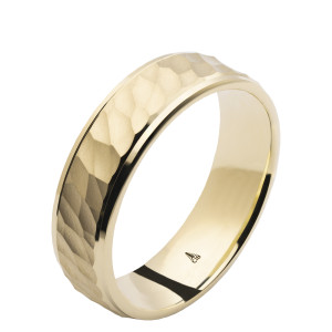 Christian Bauer 274655 14 karat yellow gold wedding band, angled view of a hammered dome stepping down to a fine polished bevel along each edge, polished interior