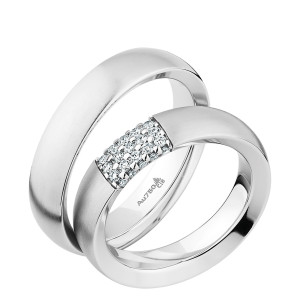 Christian Bauer 280066 18 karat white gold wedding band, angled view of a brushed flat face with crisp squared edges and a bright mirror polished interior, shown with its matching ring