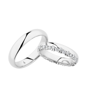 Christian Bauer 280120 14 karat white gold wedding band, angled view of a mirror polished court dome with rounded edge transitions and a polished interior, shown with its matching ring