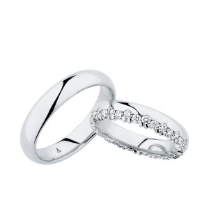 Christian Bauer 280120 platinum wedding band, angled view of a mirror polished court dome with rounded edge transitions and a polished interior, shown with its matching ring
