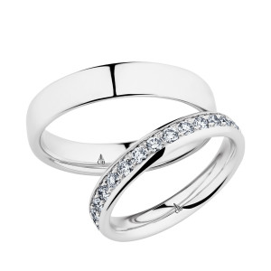 Christian Bauer 280145 18 karat white gold wedding band, angled view of a low polished dome with softly rounded edges and a mirror polished interior, shown with its matching ring