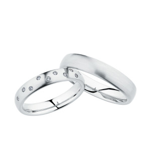 Christian Bauer 280147 platinum wedding band, angled view of a softly domed profile with a satin brushed surface and a bright polished interior, shown with its matching ring
