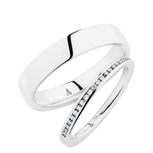 Christian Bauer 280154 14 karat white gold wedding band, angled view of a gently domed polished face with rounded edges, the surface running straight into a polished interior, shown with its matching ring